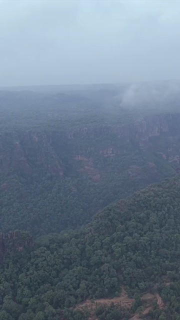 Vertical Aerial View of Rocky Hills and Misty Satpura Landscape Pachmarhi Madhya Pradesh