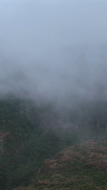 Vertical Aerial View of Rocky Hills and Misty Satpura Landscape Pachmarhi Madhya Pradesh