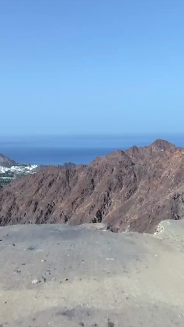Vertical Aerial View of Rugged Mountains and Gulf of Oman Coastline Muscat Oman