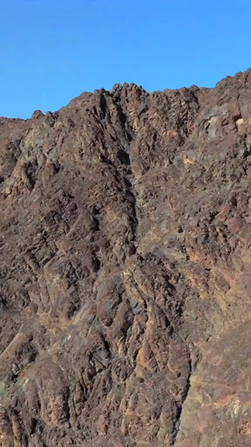 Vertical Aerial View of Rugged Mountains and Gulf of Oman Coastline Muscat Oman