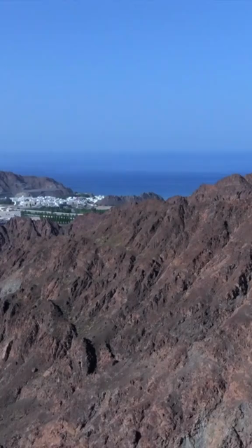 Vertical Aerial View of Rugged Mountains and Gulf of Oman Coastline Muscat Oman