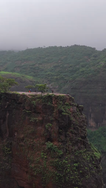 Vertical Aerial View of Savlya Ghat Waterfalls and Sahyadri Mountains Maharashtra India