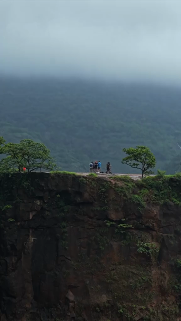 Vertical Aerial View of Savlya Ghat Waterfalls and Sahyadri Mountains Maharashtra India