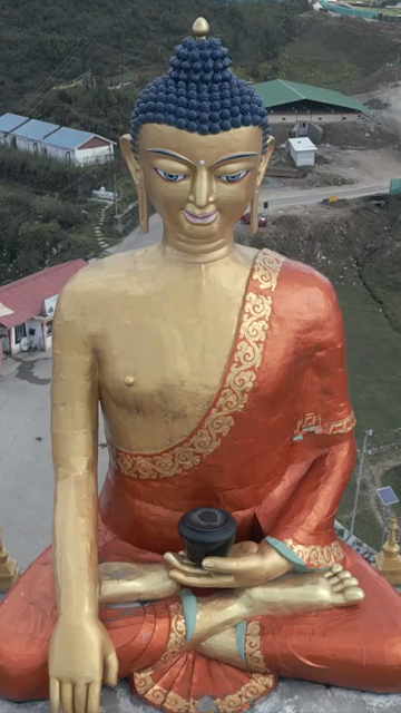 Vertical Aerial View of Shakyamuni Buddha Statue at Golden Namgyal Lhatse Monastery, Tawang