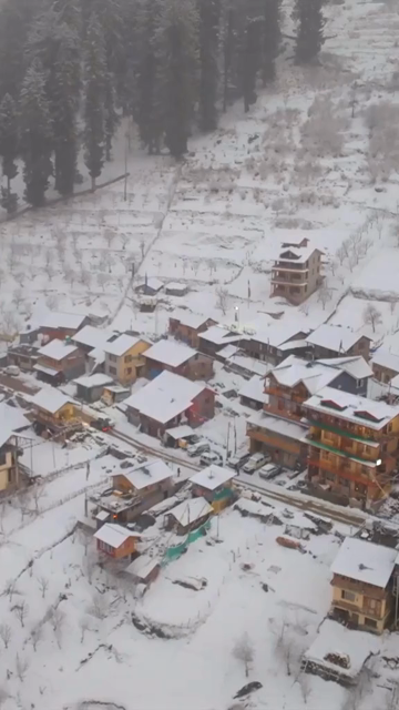 Vertical Aerial View of Snow Covered Village in Manali Himachal Pradesh India