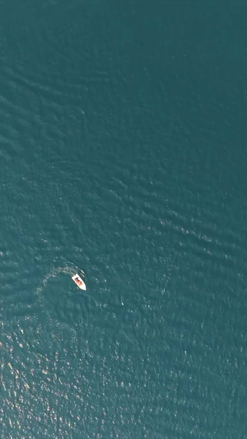 Vertical Aerial View of Speedboat at Vizag Beach India