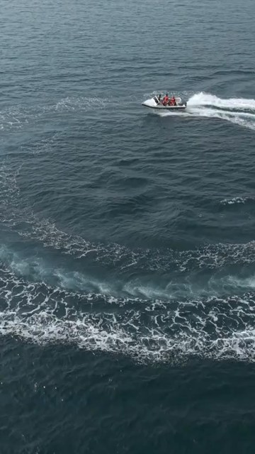 Vertical Aerial View of Speedboat at Vizag Beach India