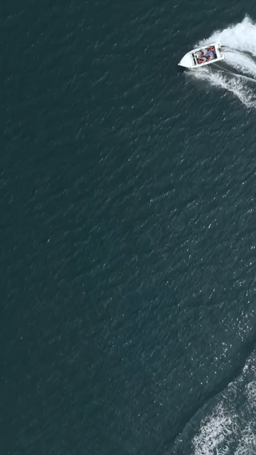 Vertical Aerial View of Speedboat at Vizag Beach India