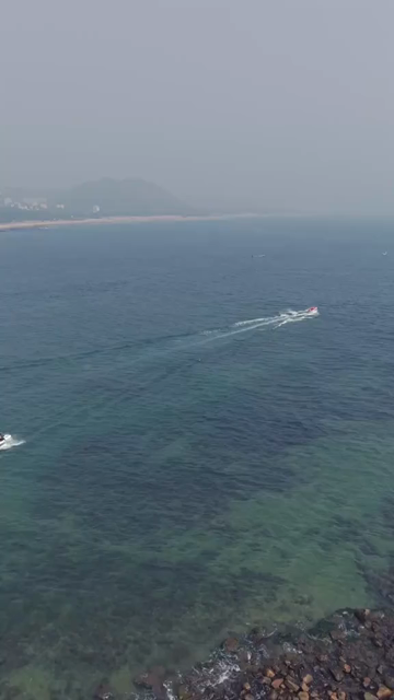 Vertical Aerial View of Speedboat at Vizag Beach India
