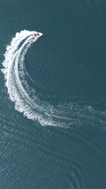 Vertical Aerial View of Speedboat at Vizag Beach India