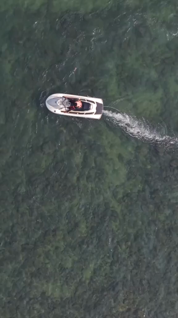 Vertical Aerial View of Speedboat at Vizag Beach India