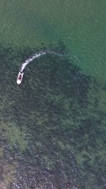 Vertical Aerial View of Speedboat at Vizag Beach India