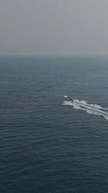 Vertical Aerial View of Speedboat at Vizag Beach India