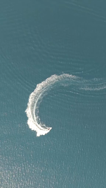 Vertical Aerial View of Speedboat at Vizag Beach India