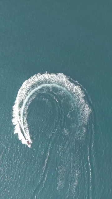 Vertical Aerial View of Speedboat at Vizag Beach India