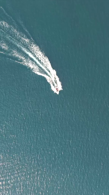 Vertical Aerial View of Speedboat at Vizag Beach India
