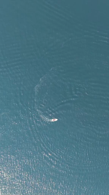 Vertical Aerial View of Speedboat at Vizag Beach India