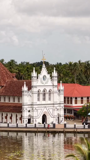 Vertical Aerial View of St. Mary’s Forane Church and Kerala Backwaters Pulinkunnu India