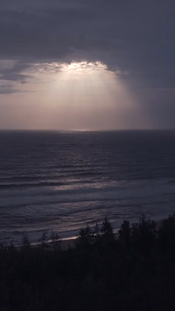 Vertical Aerial View of Sun Rays Over Sea at Apsarakonda Karnataka India