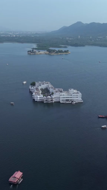 Vertical Aerial View of Taj Lake Palace Lake Pichola Udaipur Rajasthan India