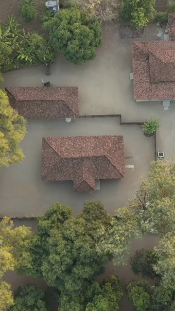 Vertical Aerial View of Traditional Rural Village and Red Tiled Houses Sri Lanka