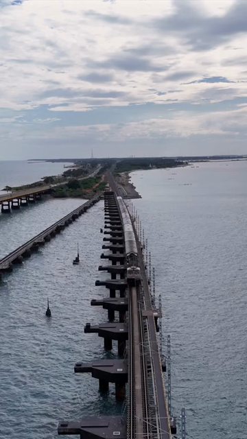 Vertical Aerial View of Train Crossing Pamban Bridge Tamil Nadu India