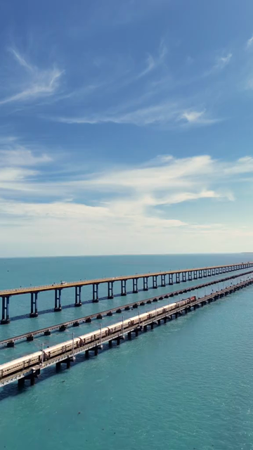 Vertical Aerial View of Train Crossing Pamban Bridge Tamil Nadu India