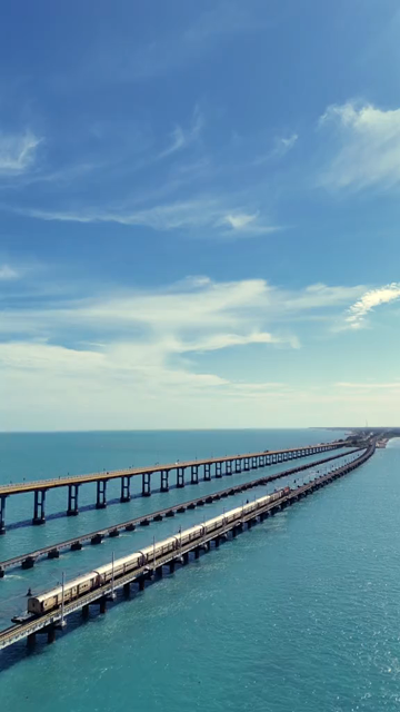 Vertical Aerial View of Train Crossing Pamban Bridge Tamil Nadu India