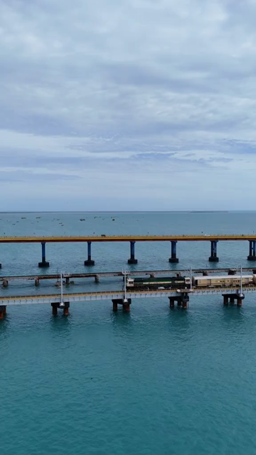 Vertical Aerial View of Train Crossing Pamban Bridge Tamil Nadu India