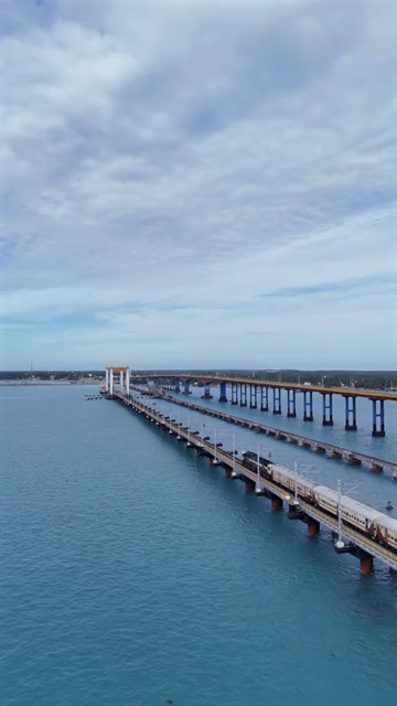 Vertical Aerial View of Train Crossing Pamban Bridge Tamil Nadu India
