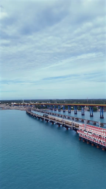 Vertical Aerial View of Train Crossing Pamban Bridge Tamil Nadu India
