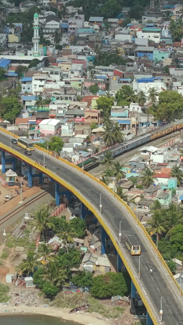Vertical Aerial View of Train Crossing Pamban Bridge Tamil Nadu India