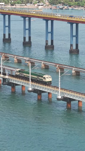Vertical Aerial View of Train Crossing Pamban Bridge Tamil Nadu India