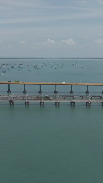 Vertical Aerial View of Train Crossing Pamban Bridge Tamil Nadu India