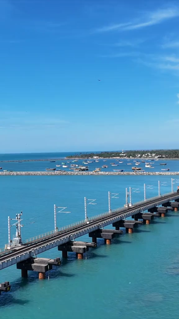 Vertical Aerial View of Train Crossing Pamban Bridge Tamil Nadu India
