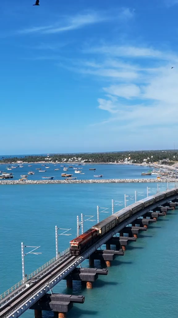 Vertical Aerial View of Train Crossing Pamban Bridge Tamil Nadu India