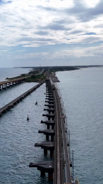 Vertical Aerial View of Train Crossing Pamban Bridge Tamil Nadu India