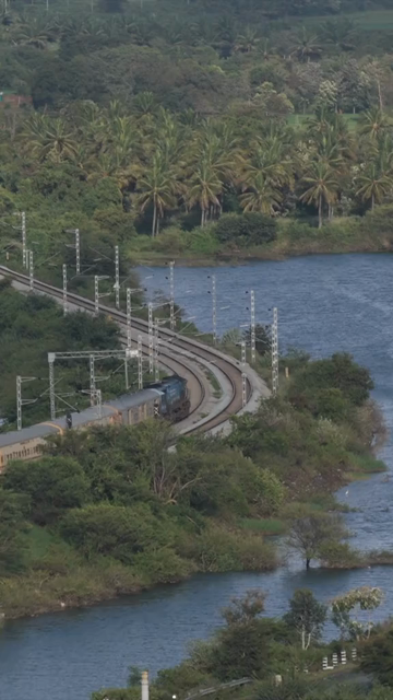 Vertical Aerial View of Train on Railway Track Near Mysuru Karnataka India