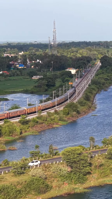 Vertical Aerial View of Train on Railway Track Near Mysuru Karnataka India