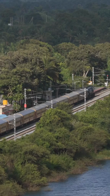 Vertical Aerial View of Train on Railway Track Near Mysuru Karnataka India