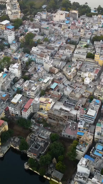 Vertical Aerial View of Udaipur City and Lake Pichola Rajasthan India
