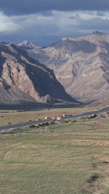 Vertical Aerial View of Vehicle on Mountain Road in Ladakh, India