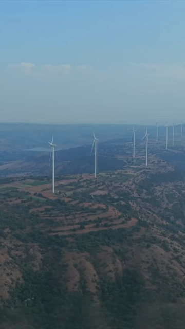 Vertical Aerial View of Wind Turbines and Mountain Landscape Goa