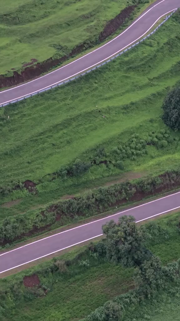 Vertical Aerial View of Winding Mountain Road on Gudhe Panchgani Plateau Sangli Maharashtra