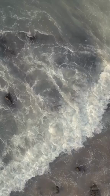 Vertical Aerial View of Waves Crashing on Yarada Beach in Visakhapatnam India