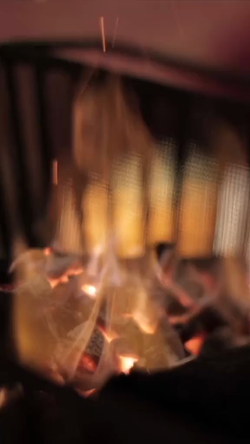 Vertical Close Up of Bonfire Flames and Glowing Embers