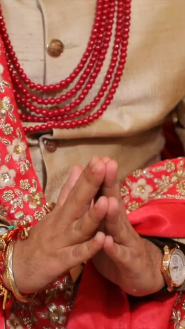Vertical Close Up of Groom Performing Traditional Rituals at an Indian Wedding