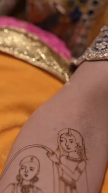 Vertical Close Up of Mehendi Applying on Bride's Hand