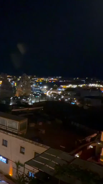 Vertical Night View of Illuminated Cappadocia Townscape in Turkey
