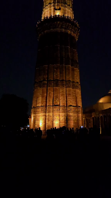 Vertical Night View of Illuminated Qutub Minar Delhi India
